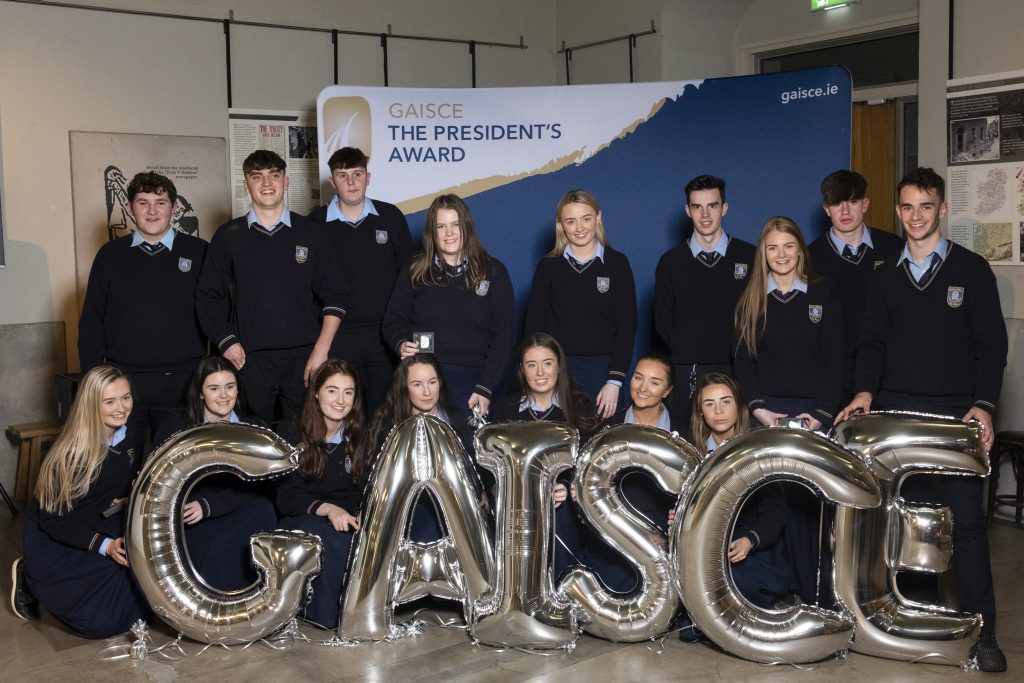Young people pictured with Silver Balloons spelling the word Gaisce