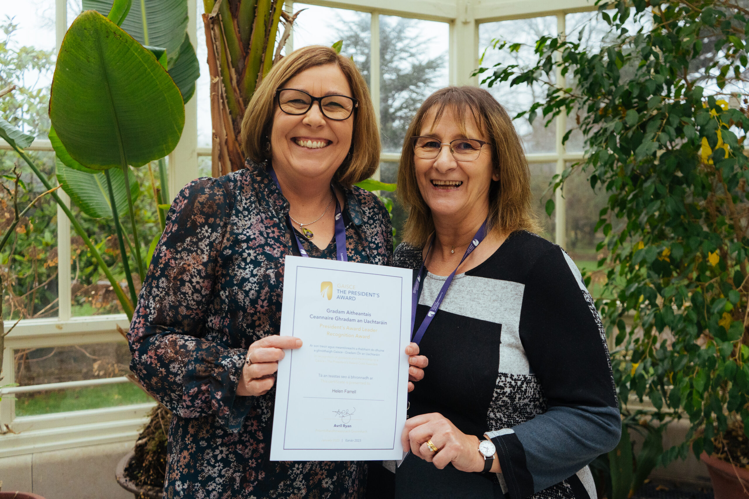 Helen Farrell posed with a colleague at the PAL Celebration Award Ceremony. She is holding her certificate proudly.